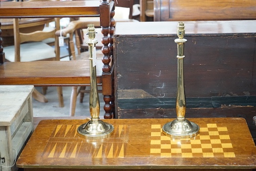 A pair of heavy brass table lamps, height 44cm